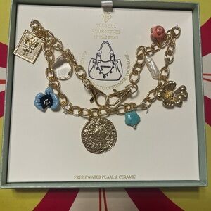 Gold tone and Blue Charm Bracelet with Delicate Charms for your handbag